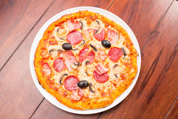Top view of pizza mushroom and salam