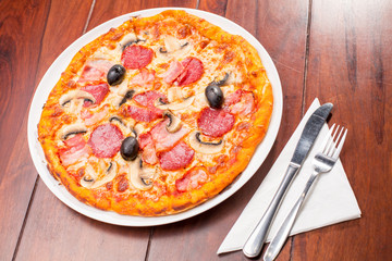 Top view of pizza mushroom and salam