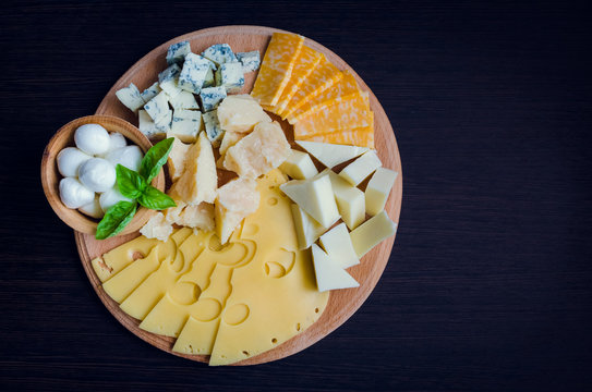 Tasty appetizer. Plate of Cheese.