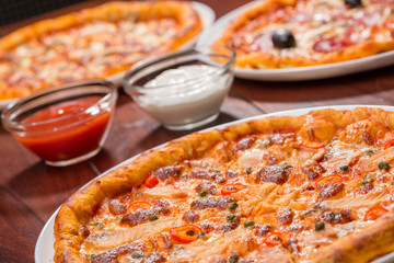 Three pizza suggestion of presentation menu with salmon