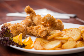 Chicken strips with potatoes