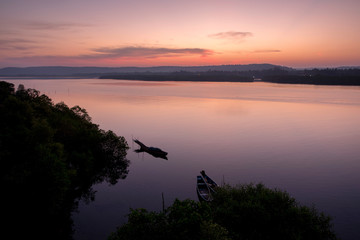 Fototapeta na wymiar sunrise over the river in India