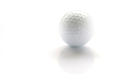 white golf ball on shiny mood