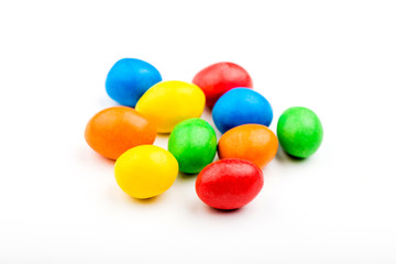 Colored chocolate candies, isolated on white background