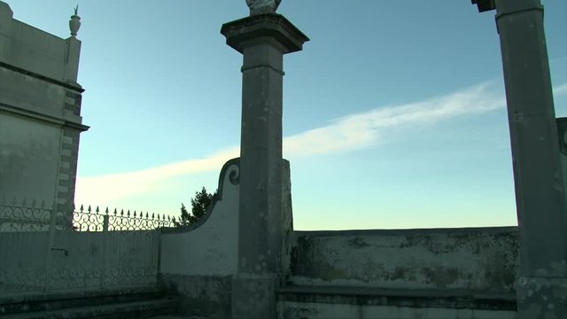 Ancient castle terrace, column and walls, balcony view, clear blue sky, Sintra Portugal