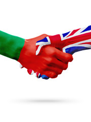 Flags Portugal, United Kingdom countries, partnership friendship handshake concept.