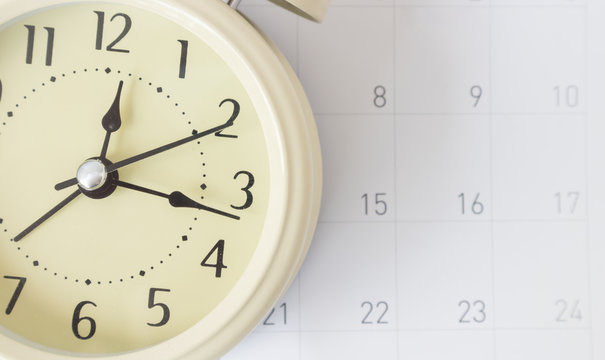 Retro alarm clock and calendar, time concept