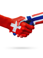 Flags Switzerland, Norway countries, partnership friendship handshake concept.