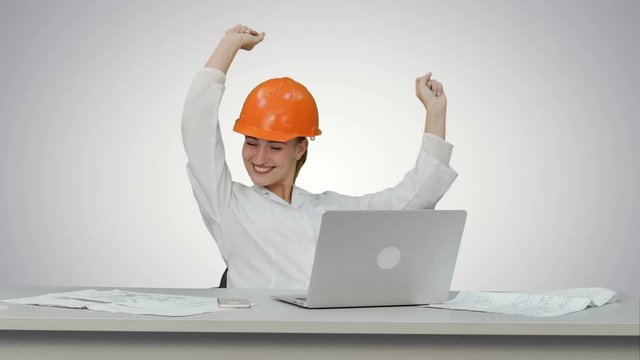 Female chief engineer celebrate a successful finish of project, smiling on white background.