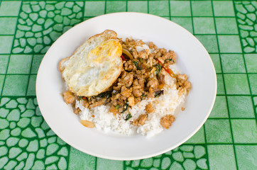 Thai street food (Ka prao moo kai dao),Fried spicy basil pork with fried egg 