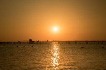 Fototapeta na wymiar Sunset on a summer evening in the sea.