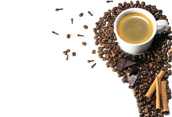 Freshly Cup of Coffee with coffee beans, cinnamon, chocolate, cloves in form of drop, closeup, white background, free space for text