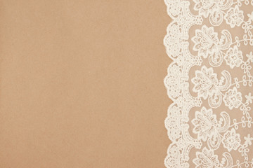 Vintage lace on a cardboard background. Packaging. Boho style. - 143415219