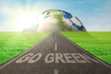 Highway with globe and Go Green text
