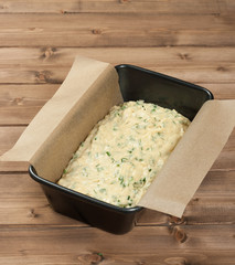 Cooking Process Of Cake With Parmesan, Dill, Chives. Raw Dough In Baking Tray.