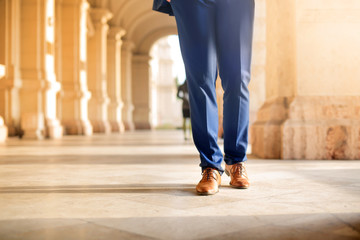 Businessman walking in the street