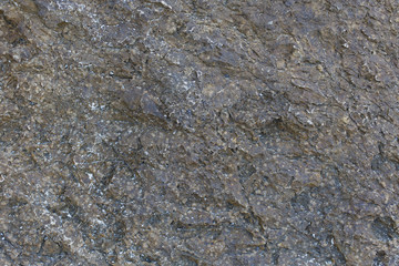 Stone background on mountain side