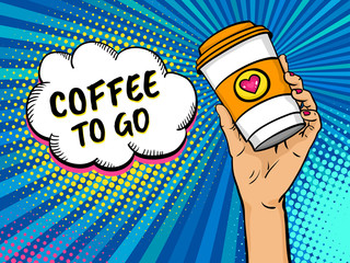 Pop art background with female hand holding bright travel coffee mug and speech bubble with Coffee to go text. Vector colorful hand drawn illustration in retro comic style. - 143419624