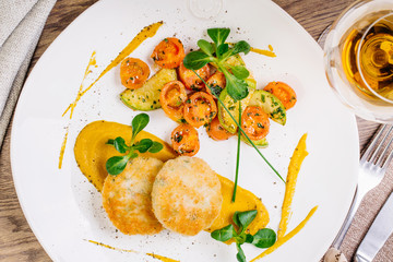 Chicken cutlets, grilled zucchini and fresh vegetable salad