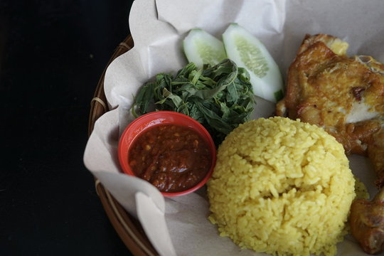 Fried Chicken Rice, Among the most popular food in Borneo. Local calll Nasi 