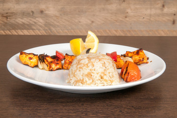 Grilled meat dish of shish kebab with onion