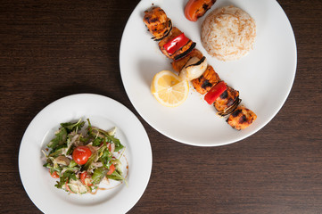 Grilled meat dish of shish kebab with onion