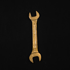 Letter I. Alphabet made of golden repair tools