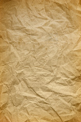 Fototapeta premium background texture of old crumpled wrapping paper close up