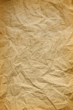 background texture of old crumpled wrapping paper close up