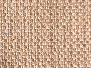 Texture of old textile vintage background with a pattern of brown color closeup