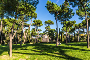 Fototapeta premium Rome, Italy. Villa Borghese: a monument to King Umberto I in a picturesque park.