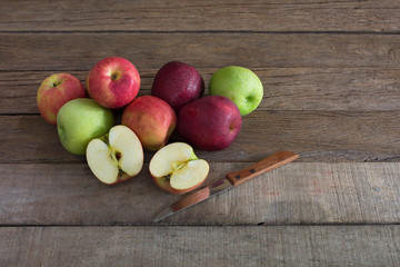 Pile of fresh apples put on old wooden background