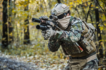 United states Marine Corps special operations command Marine Special Operator also known as Marsoc raider wearing camouflage uniforms in the forest