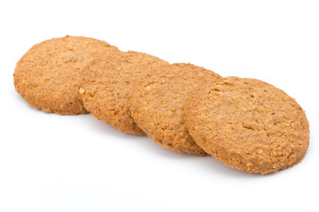 Stacked short pastry cookies isolated on white background.