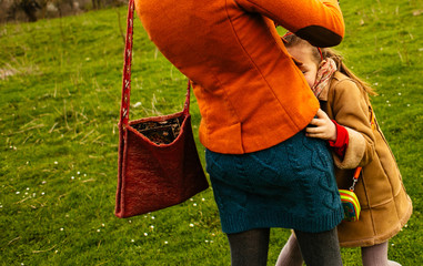 The mother embarcing her daughter