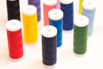 bobbins with sewing thread in many different colors