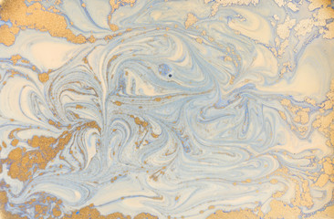Fototapeta premium Blue and golden liquid texture, watercolor hand drawn marbling illustration, abstract background