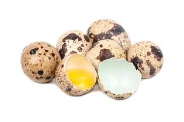 Bunch of fresh quail eggs on white background