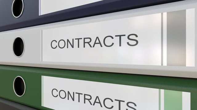 Office binders with Contracts tags