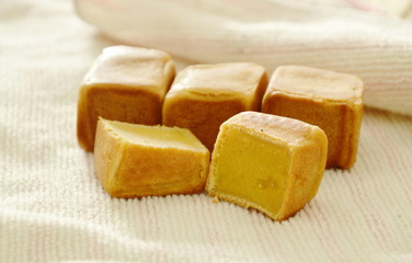 Chinese square pasty stuffed mush sweet bean on cloth