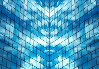 Obraz na płótnie Canvas Reflected blue sky in skyscraper windows