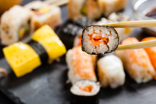 Slate tray of assorted sushi