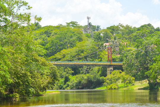 The iconic Hawksworth Suspension Bridge, over the Macal River, in Belize