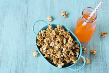 Caramel Popcorn Snack With Orange Soda Pop
