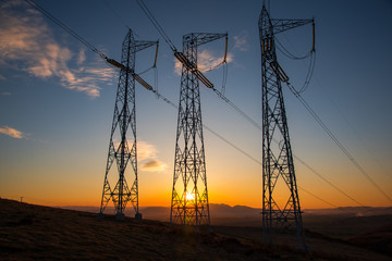 Eletric pylons at sunset
