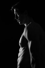Sexy Shirtless Muscular Male Model on Black Background - 143438486