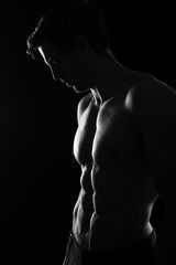 Sexy Shirtless Muscular Male Model on Black Background - 143438622