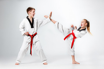 The studio shot of group of kids training karate martial arts © master1305