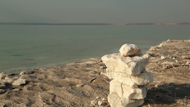 White salt deposits of Dead Sea. Salt on the shore of Dead Sea in Jordan
