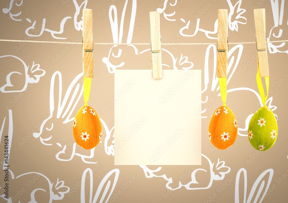 Poster easter eggs on pegs with note in front of pattern